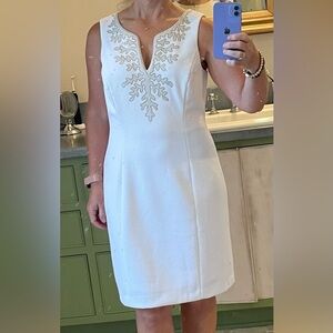 Pappagallo white dress with gold embellishments.